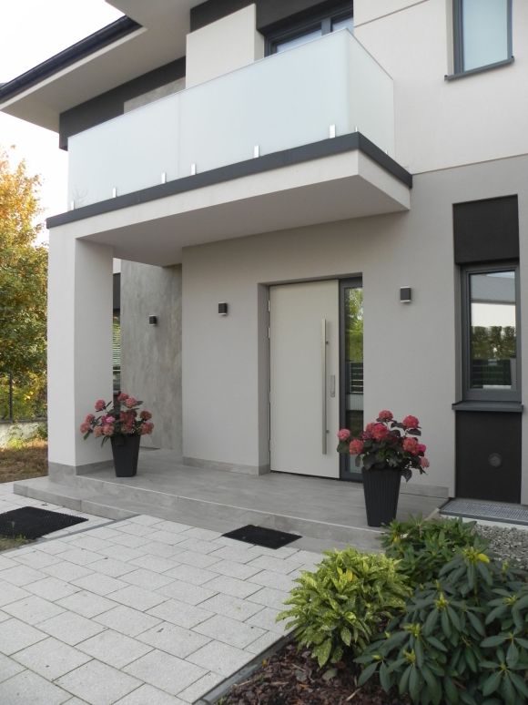 Projekt elewacji domu. nowoczesna elewacja. domu piętrowego.  realizacja projektu elewacji nowoczesnego domu 